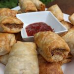 homemade sausage rolls with beef mince and puff pastry